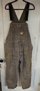 Mono con tirantes aislado vintage CAT Caterpillar talla 38 gris/amarillo - Imagen 1 de 10