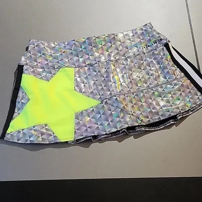 Falda Tenis Lucky in Love Pop Star Plateada (Holograma) Negra Estrella Verde Neón Talla XL Foto 1 de 4