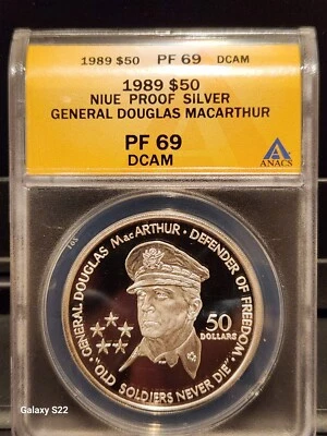 1989 $50 NIUE Ag GENERAL DOUGLAS MacARTHUR ANACS PF 69 DCAM Defender Of Freedom  - Image 1 of 4