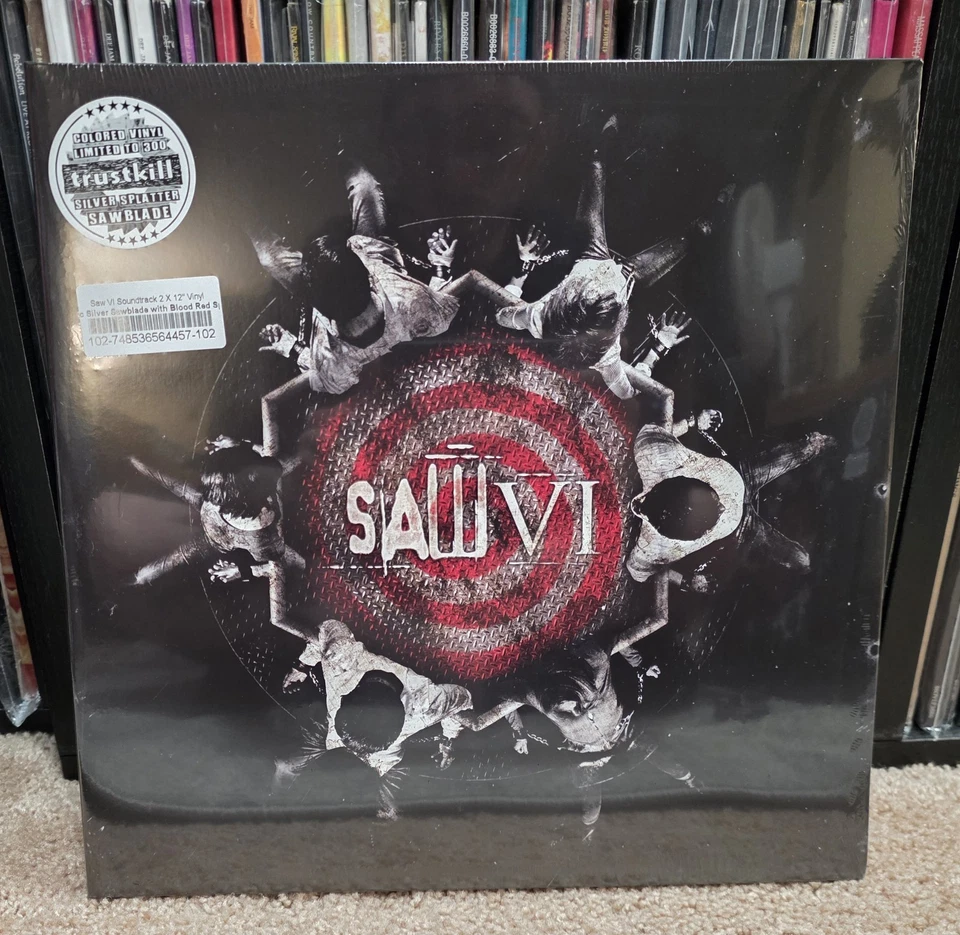 Saw Vl Soundtrack 2xLP Metallic Silver Saw Blade Vinyl with Red Splatter XX/300 - Image 1 of 4