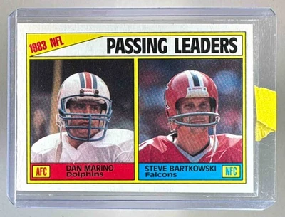 1983 Passing Leaders (Dan Marino Steve Bartkowski) 1984 Topps #202 A - Image 1 of 3