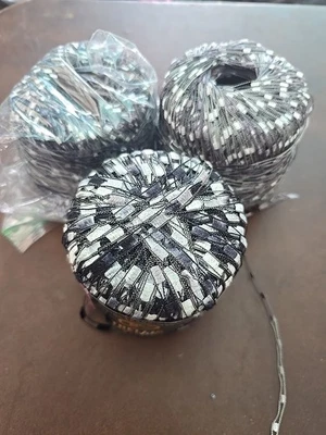 Lion Brand Trellis Shimmering Laxy Ribbon Yarn  Gray And White Black - Image 1 of 4