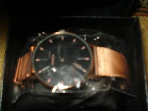 Black Geneve Watch Clock on golden color wrist band - Bild 1 von 7