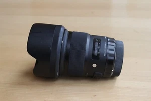 Objektiv Sigma 50mm f1.4 DG HSM Art Canon EF Mount mit Originalverpackung - Bild 1 von 7
