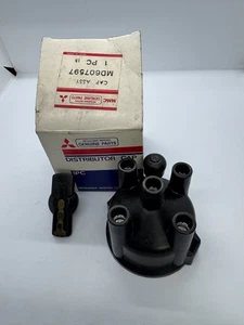 MD607597 New OEM Genuine Mitsubishi Cap assy, distributor and distributor rotor - Picture 1 of 9