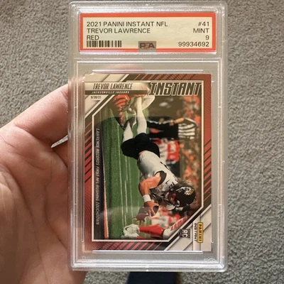 2021 Panini Instant Red Trevor Lawrence Jaguars Rookie RC #/99 PSA 9  #41 - Image 1 of 2