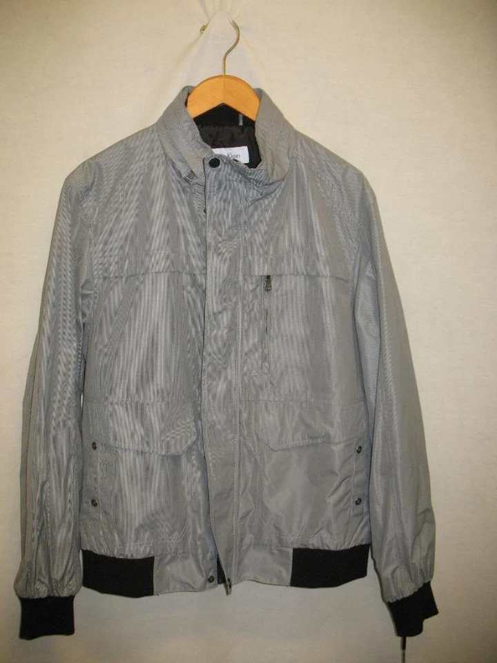 Chaqueta cortavientos básica Calvin Klein cremallera completa negra blanca rayas finas para hombre L Foto 1 de 4