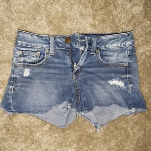 Pantalón Corto American Eagle Super Stretch Distressed Super Hi-Rise Talla 2 - Imagen 1 de 7