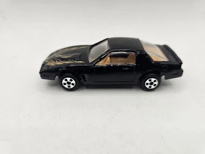 Pontiac Firebird Trans Am epoca anni 80 vintage 1:64 pressofuso senza marchio VHTF nero - Foto 1 di 5