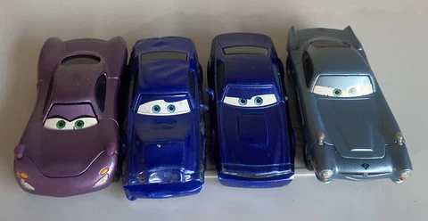 Disney Pixar Cars Diecast Lot Of 4 (2 Rod Torque Redlines, Finn McMissile, Holly Cover
