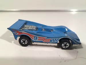 HOT WHEELS Parete Nera COLORI VOLANTI VITTORIA AMERICANA FORMULA AUTO CANADA - Foto 1 di 12