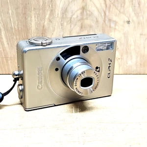 Cámara fotográfica compacta Canon Elph2 APS película cargada y estuche probado y funcionando  - Imagen 1 de 11