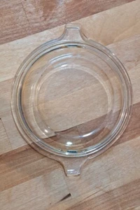 VTG PYREX CLEAR GLASS ROUND LID WITH TAB HANDLES, #680-C-31 YELLOW HUE RIM - Picture 1 of 9