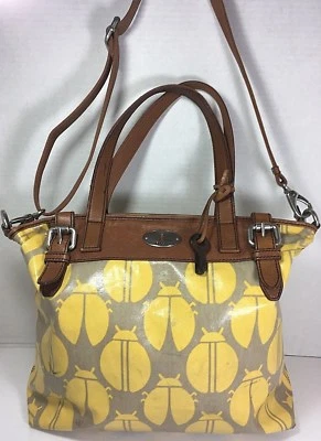 Bolso Bandolera Fossil Extra Grande Estampado de Insectos Amarillos con Lona Recubierta Gris Foto 1 de 4