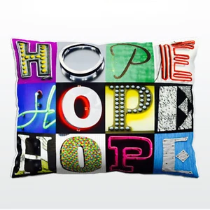 Personalized Pillow featuring the name HOPE in photos of sign letters - Picture 1 of 1