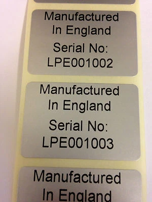 WWW.SPOTLABELS.CO.UK Rolls of Printed Personalised SILVER Serial Number / Barcode Labels 38mm x 25mm