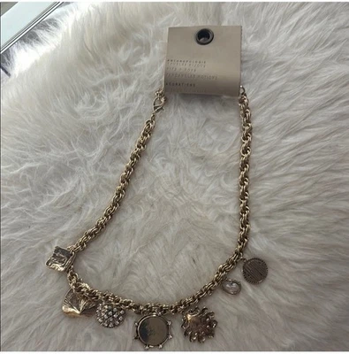 Collar Anthropologie tono dorado con múltiples colgantes Foto 1 de 4
