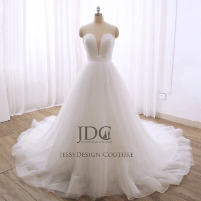 Vestido de novia de tul brillante limpio y fluido hecho a medida talla grande blanco Foto 1 de 4