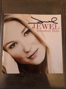 Jewel Kilcher Signed Autographed Greatest Hits CD Booklet Guaranteed Authentic - Picture 1 of 3