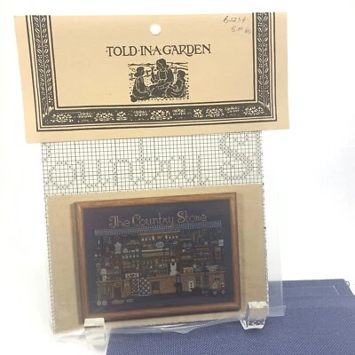 Told In A Garden The Country Store Cross Stitch Pattern Jobelin Fabric New Vtg - Image 1 of 4