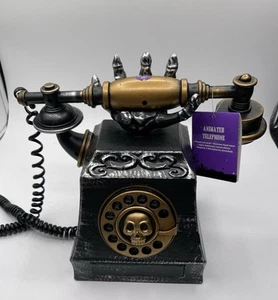 Téléphone parlant squelette Halloween hanté avec son et main qui sort cônes - Photo 1/10