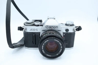 ❤️ Cámara fotográfica Canon AE-1 plateada 35 mm SLR con lente Canon FD 50 f/1,8 ❤️ Foto 1 de 4