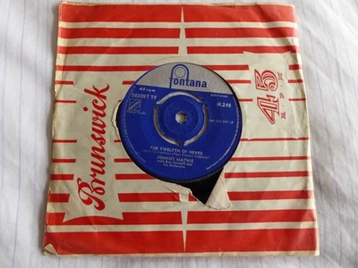 JOHNNY MATHIS...THE TWELFTH OF NEVER / GET ME TO THE CHURCH ON TIME 7" single - Image 1 of 2