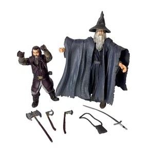 Figuras de acción Toybiz LOTR 2001 Fellowship of the Ring GANDALF y GIMLI Swing - Imagen 1 de 9