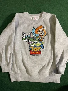 OUT OF PRODUCTION COLLECTIBLE BOYS MEDIUM TOY STORY SWEATER FROM DISNEY STORE  - Picture 1 of 3