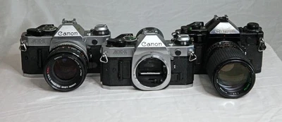 Cuerpos CANON: Programa AE-1 (2); A-1 (1); Lentes (2) Para piezas o reparación Foto 1 de 4