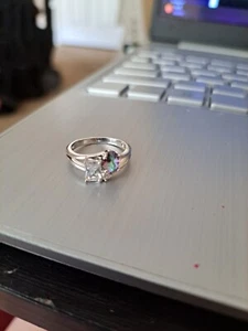 SILVER PLATED COSTUME RING WITH CLEAR GLASS STONE AND RAINBOW STONE SIZE 6- NEW - Picture 1 of 3