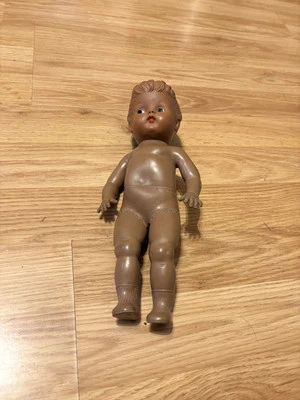 Muñeca de colección negra/marrón linda muñeca bebé ojo lateral tal vez años 50  Foto 1 de 4