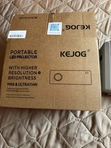 Kejog White Remote Control Mini And Ultrathin Portable LED Video Projector Works - Picture 1 of 9