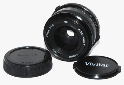 Lente gran angular Vivitar 28 mm f/2,8 MC para Olympus OM limpia y transparente Foto 1 de 4