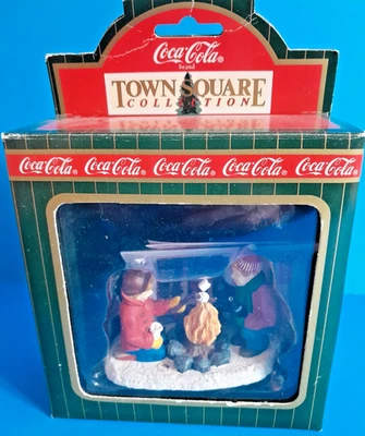 Coca-Cola Town Square Collection Kids toasting marshmallows - Image 1 of 4