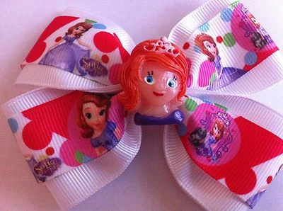 Moño de pelo para niñas de 4" de ancho Sofía la primera cinta blanco grosgrain pasador francés Foto 1 de 3
