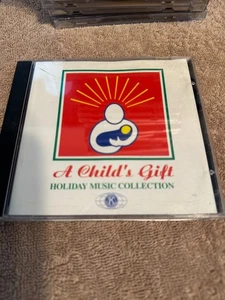A Child's Gift Holiday Music Christmas Collection CD - VERY GOOD CONDITION - Foto 1 di 2