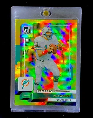 DAN MARINO REFRACTOR ARCO IRIS ORO PRIZM SP Paralelo Panini Donruss - DOLPHINS Foto 1 de 4