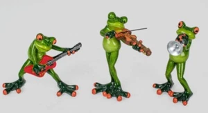 717115 Banco de músicos trío de ranas verde claro 14 cm de piedra artificial y detalles divertidos - Imagen 1 de 1