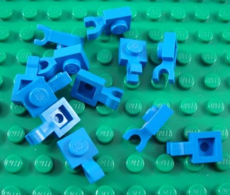 LEGO Lot of 12 Blue 1x1 Plates with Horizontal Clip - Image 1 of 1
