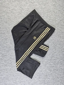 Pantalones deportivos Adidas Originales Para mujer de colección años 80 38 negro dorado nailon ACORTADOS - Imagen 1 de 15