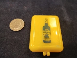Cocktail Pick Halter Werbung Corny's Whiskey, Kunststoff Etui - Bild 1 von 4