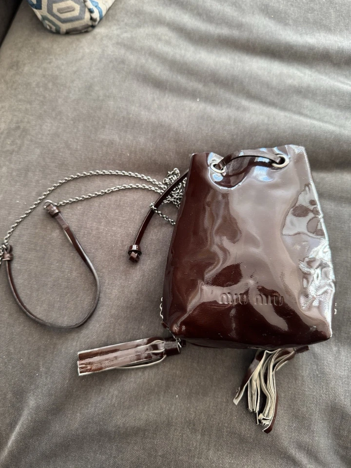 Mini bolso bandolera vintage Mumu de cuero marrón con borlas nunca usado Foto 1 de 4