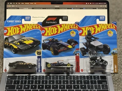 Red Bull Formula 1 , Tesla Cyber Quad. , K.I.T.T Hot Wheels D Case 2025 - Image 1 of 2