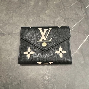 Louis Vuitton Bi fold Wallet Victoriine Black - Picture 1 of 9