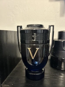 INVICTUS VICTORY ELIXIR by Paco Rabanne (MEN) - PARFUM INTENSE SPRAY 1.7 Oz. - Picture 1 of 2