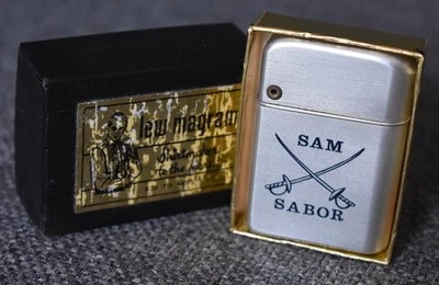 NEVER USED VINTAGE STORM MASTER LIGHTER SATIN CHROME FINISH WITH SAM SABOR LOGO - Image 1 of 4