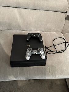 PS4 Pro 1TB + 2 controllers + original box and cable