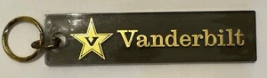"Llavero universitario Vanderbilt - 7"" plástico transparente negruzco y letras doradas" - Imagen 1 de 6