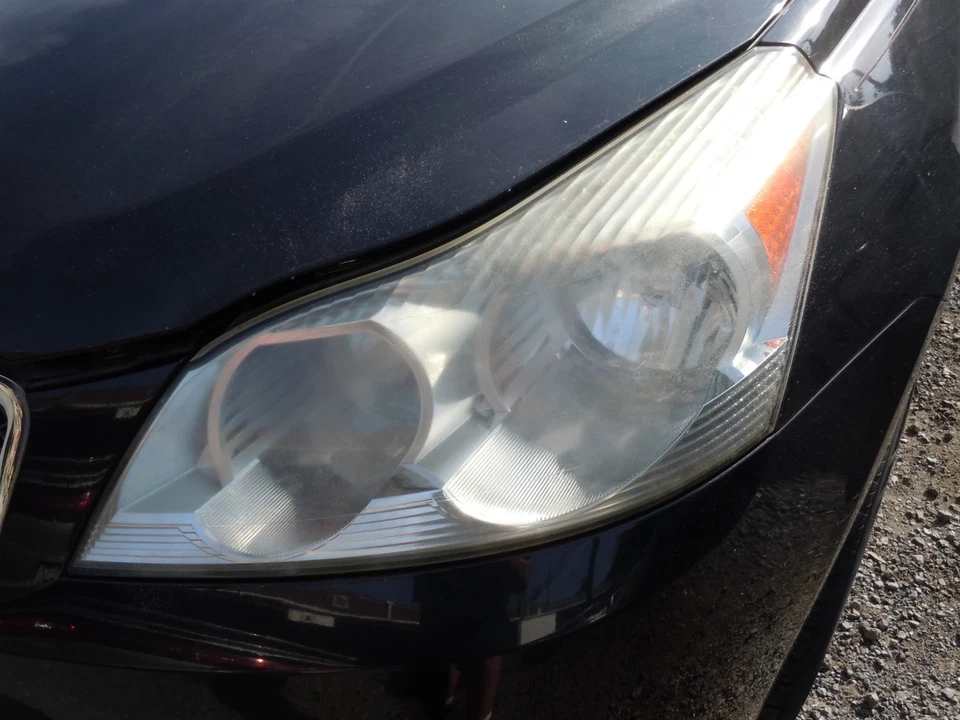 Faro halógeno izquierdo Chevrolet Traverse 09-12 sin haz proyector OEM Foto 1 de 1